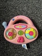 Radio musical y luces de canto suave rosa Vtech juguete interactivo