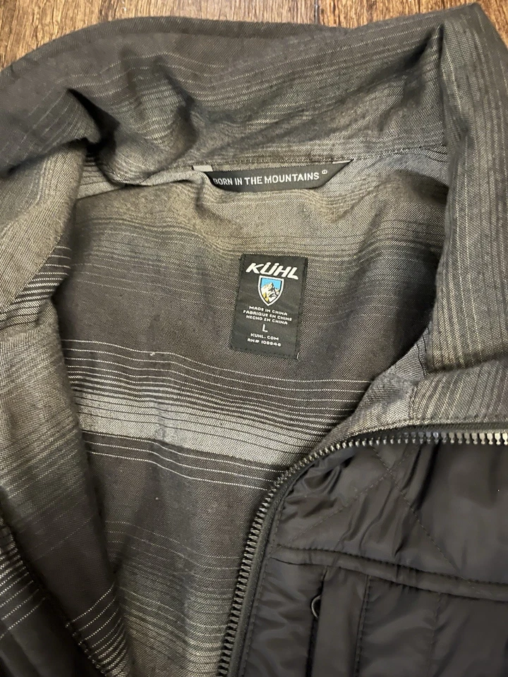 Chaqueta aislante de peso medio grande acolchada negra Kuhl Rebel para hombre Foto 2 de 4