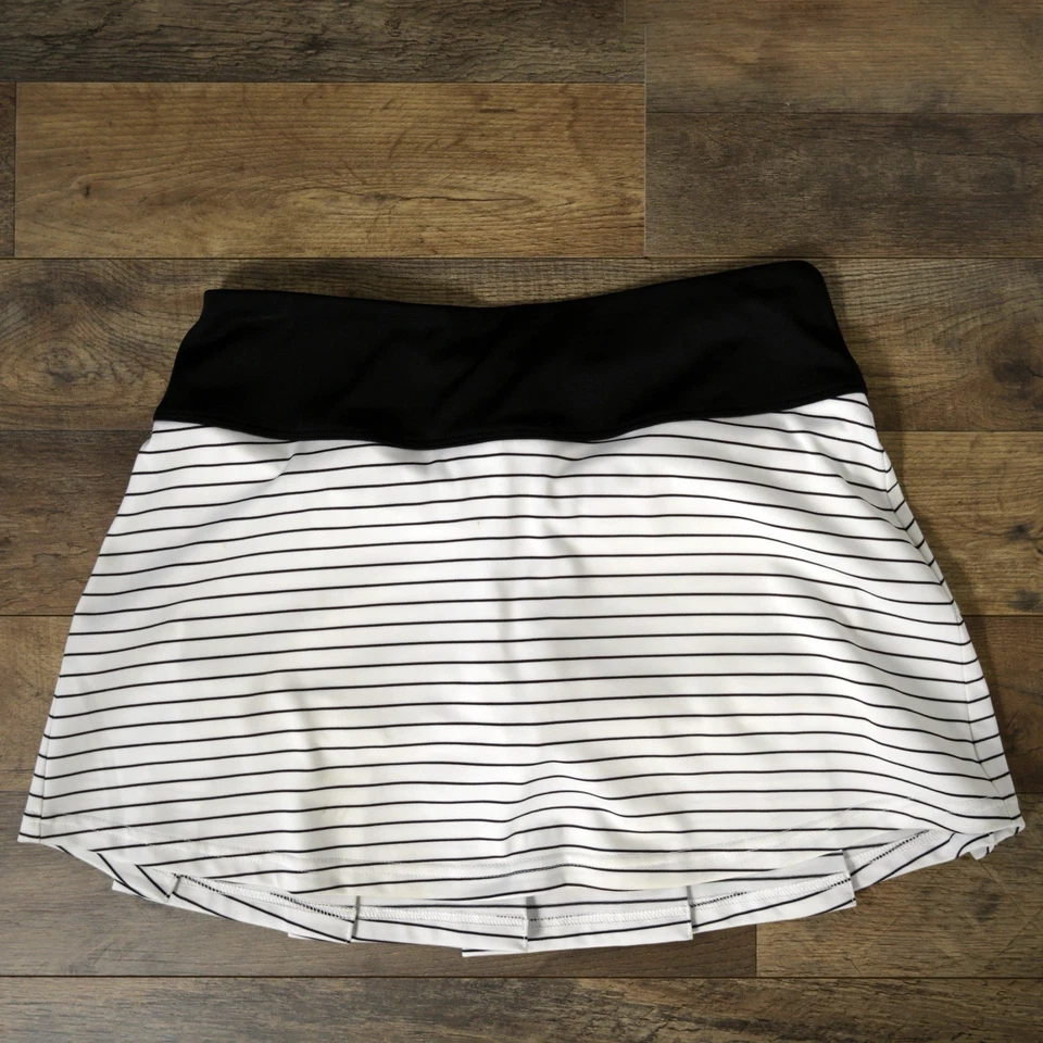 Falda atlética plisada a rayas blancas y negras Bolle Tech para mujer S. Foto 2 de 4