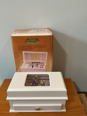 Gold Label Collection musical jewelry box featuring animated figurines