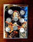 Eight 1 gram Fine Silver Monarch Rounds