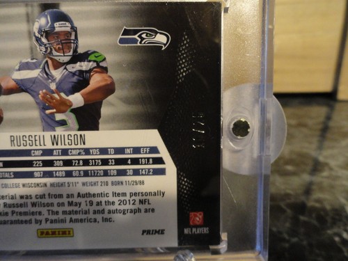 Russell Wilson MOMENTUM ROOKIE #131 /25 Auto, Game Worn - 第 5/6 張圖片