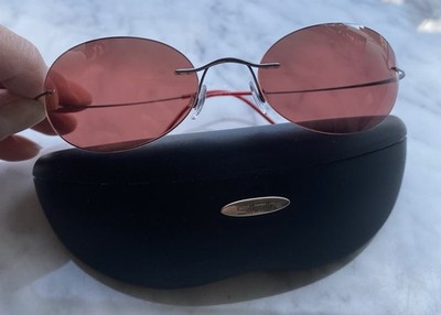 Silhouette - Vintage Model Sunglasses. Rimless, Pink lenses.