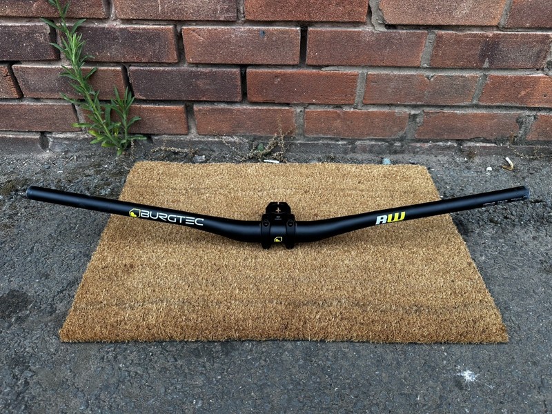 Burgtec Ride Wide 30mm rise Bars and OneUp EDC 42mm Stem.  