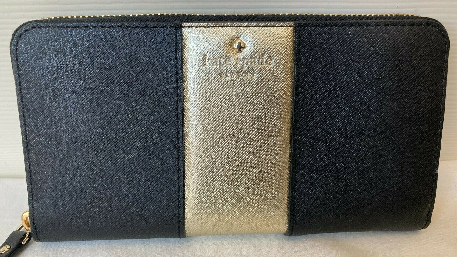 pink kate spade wallet with bow
