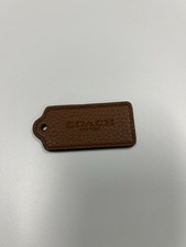 coach british tan Textured hang tag