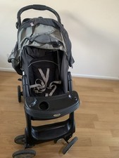 Graco pushchair in dark grey and black.