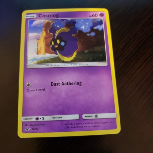COSMOG SM42 Sun & Moon Black Star Promo Holo Pokemon Card 2017