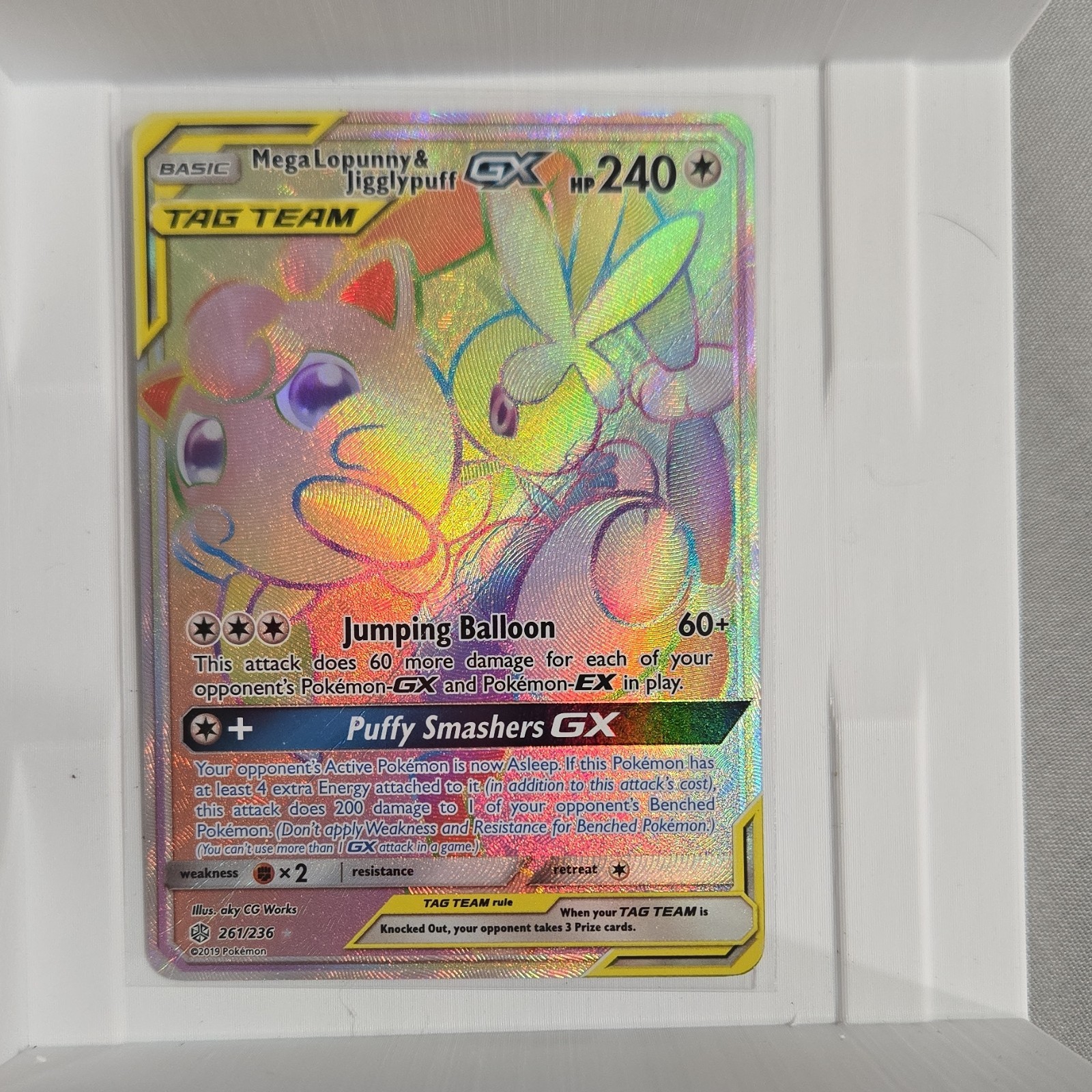 Pokémon Mega Lopunny & Jigglypuff GX  261/236 Secret Rare Holo has crease