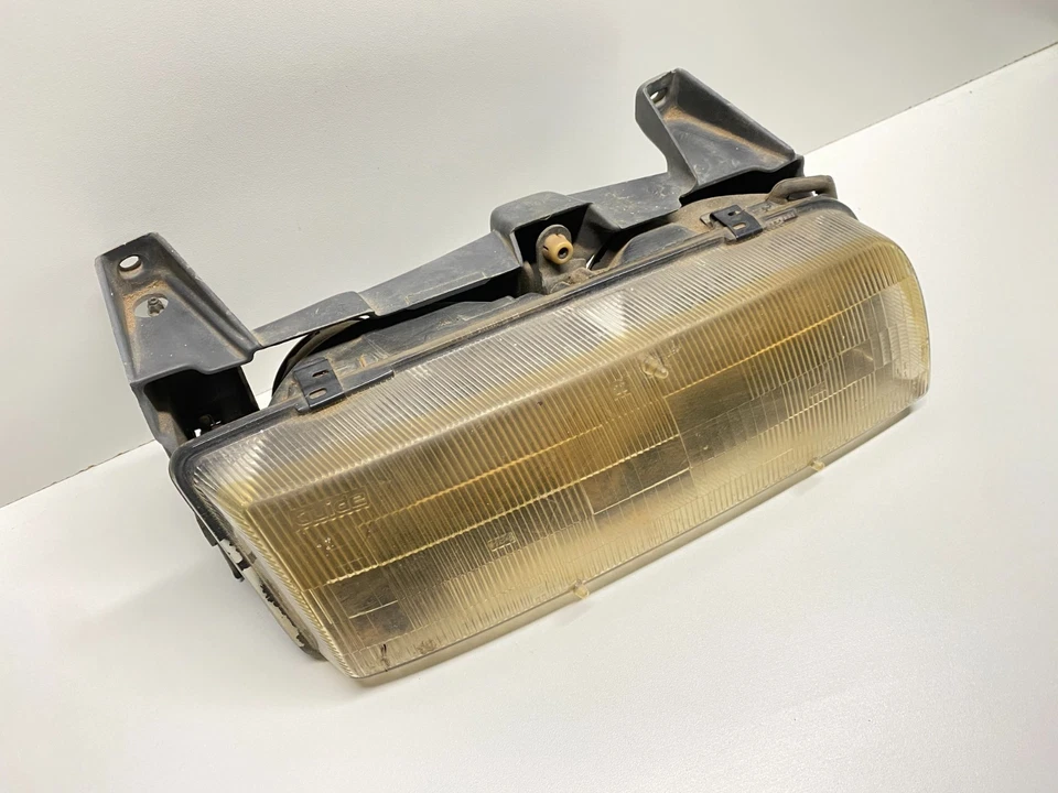 Faro delantero izquierdo Chevrolet Beretta 1991 OEM, 114-00182B Foto 4 de 4