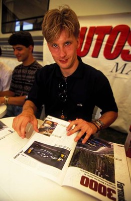 Race winner Kenny Brack Super Nova reads race programme Intern- 1996 Old Photo