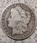1899 E. Pluribus Unum O mint silver dollar