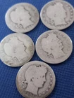 five old silver barber quarters