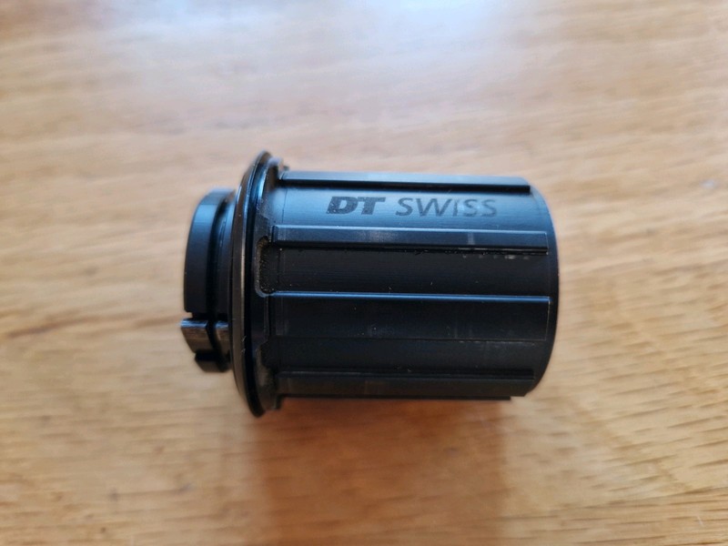 DT Swiss Freehub. Hybrid. 11 Speed Road. Shimano HG. 3 Pawl. 12mm Thru-axle