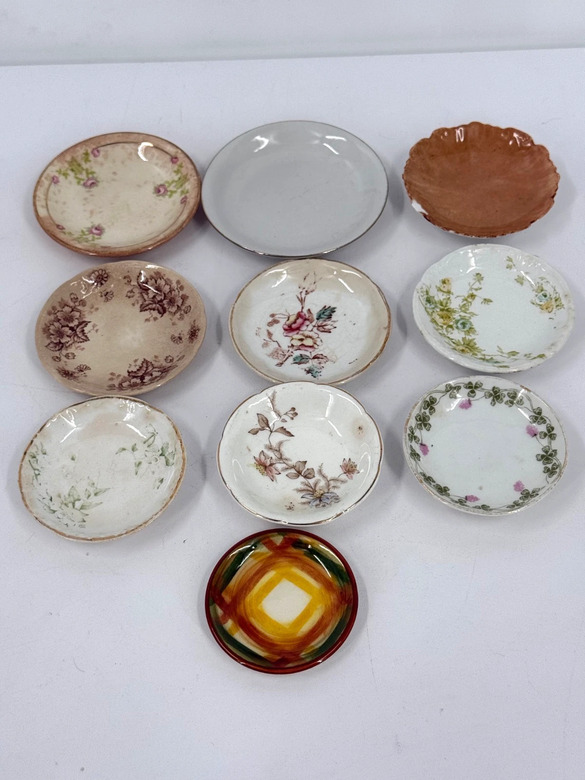 Antique Vintage Lot of 10 Mixed Butter Pats Various Patterns & Sizes
Opens in a new window or tab