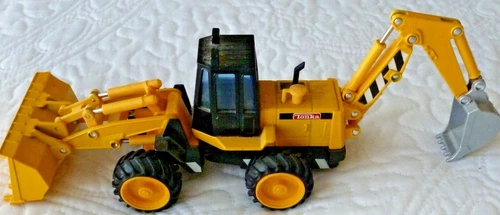 rare vintage diecast Tonka metal loader shovel with friction drive wheels Maisto
