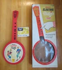 EMENEE MAGIC ELECTRIC BANJO  UNUSED IN BOX  AUTOMATIC PUSH BUTTON PLAYER 