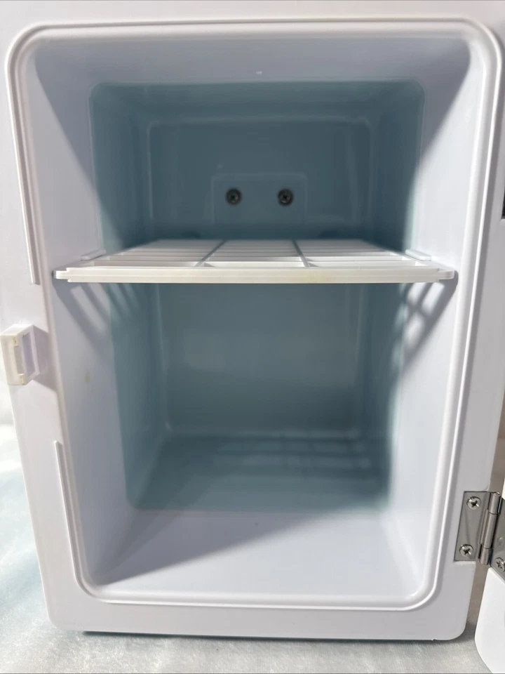 Mini refrigerador de bebidas Igloo (MIS129-B-AZUL) - Tiene capacidad para 6 latas (0,14 cuft) Foto 4 de 4