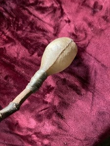 antique native rattle made from bull testicle
