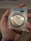 PCGS MS64PL w/ CAC 1880-S Morgan Silver Dollar w/ Orange Toning On Obverse
