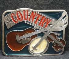 XC05142 NOS VINTAGE 1970s COUNTRY MUSIC GENRE INSTRUMENTS MENS BELT BUCKLE