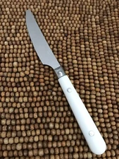 CREAMY WHITE Stainless Plastic Silver Painted Rivets SERRATED DINNER KNIFE 7.75”