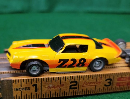 Tyco '79 Camaro Yellow Orange Black Stripe Z28 HP2 Slot Car 6977 w Bonus Chasis - Picture 8 of 21