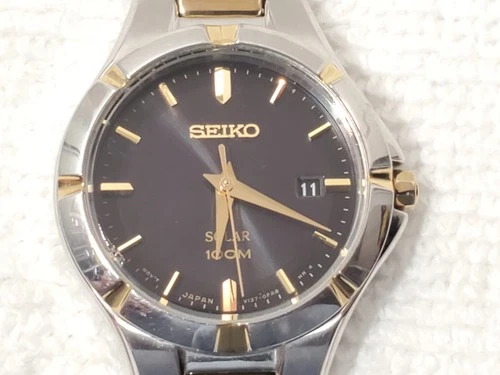 Vintage Seiko Solar Stainless Steel Gold Tone Women's Watch Black Dial Date 100M