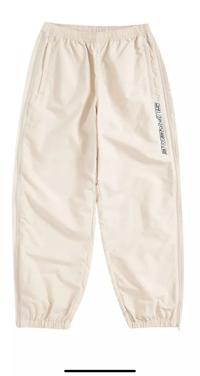 Pantalon d'échauffement à fermeture éclair en nylon Supreme / pierre / taille grande flambant neuf SS24