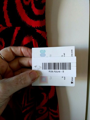 NEW GIRL'S LULAROE KIDS AZURE BLACK WITH RED PRINT STRETCHY SWING SKIRT SIZE 8 - Picture 3 of 3