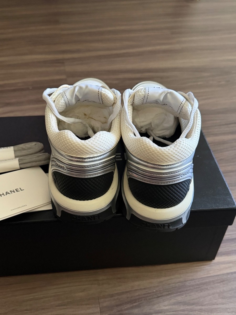 Authentic white Chanel sneakers size 39 worn twice. Minor scratch