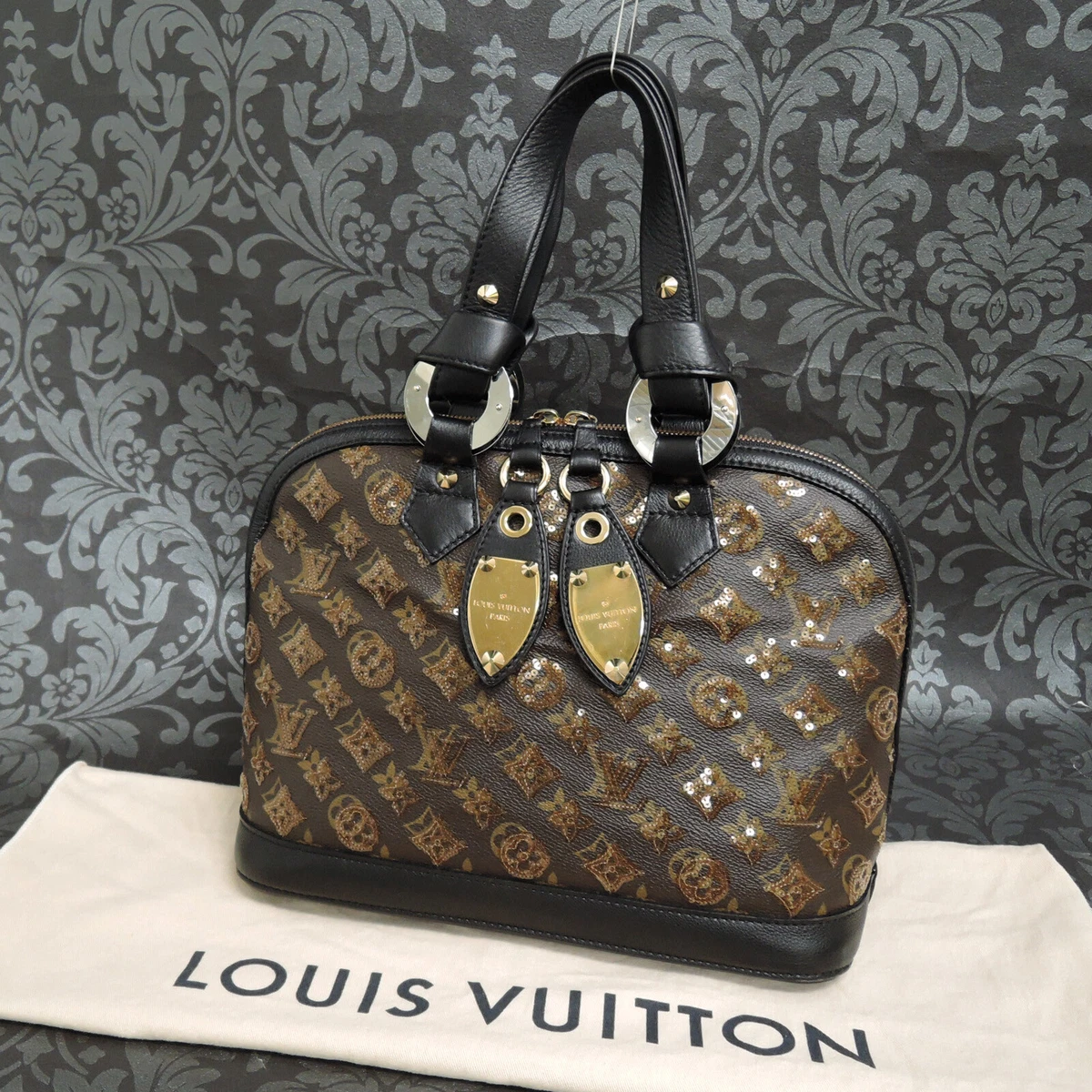 Louis Vuitton • Tise