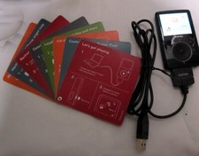 SanDisk Sansa Fuze 2GB FM/MP3 Player w/microSD slot Bundle Earbuds  CD Black