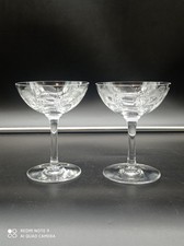 2 coupes à Champagne en Cristal de BACCARAT modèle Molière , 12,5 cm .