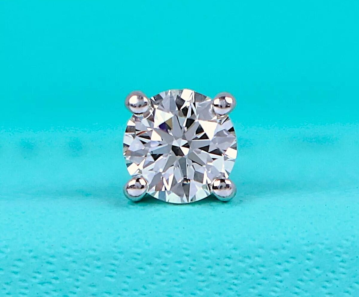 $7,500 Tiffany & Co Platinum Round 0.71ct J VVS1 Diamond One $7,500 Tiffany & Co Platinum Round 0.71ct J VVS1 Diamond One