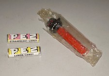 ORIGINAL VINTAGE PEZ NO FEET GORILLA WITH WRAPPER AND TWO PACKS CANDY NICE!