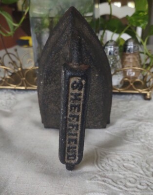 Vintage iron door stop Sheffield #7 cast iron clothing press ironing