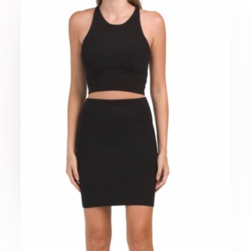 NUEVO CON ETIQUETAS House of Harlow Negro Acanalado Tejido Elástico Suéter Mini Falda Conjunto Talla Med - Imagen 1 de 9