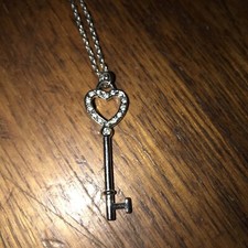 silvertone heart top skeleton key with rhinestones