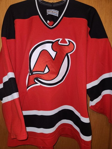CCM New Jersey Devils vintage Ultrafil red jersey w/fight strap sz. 54