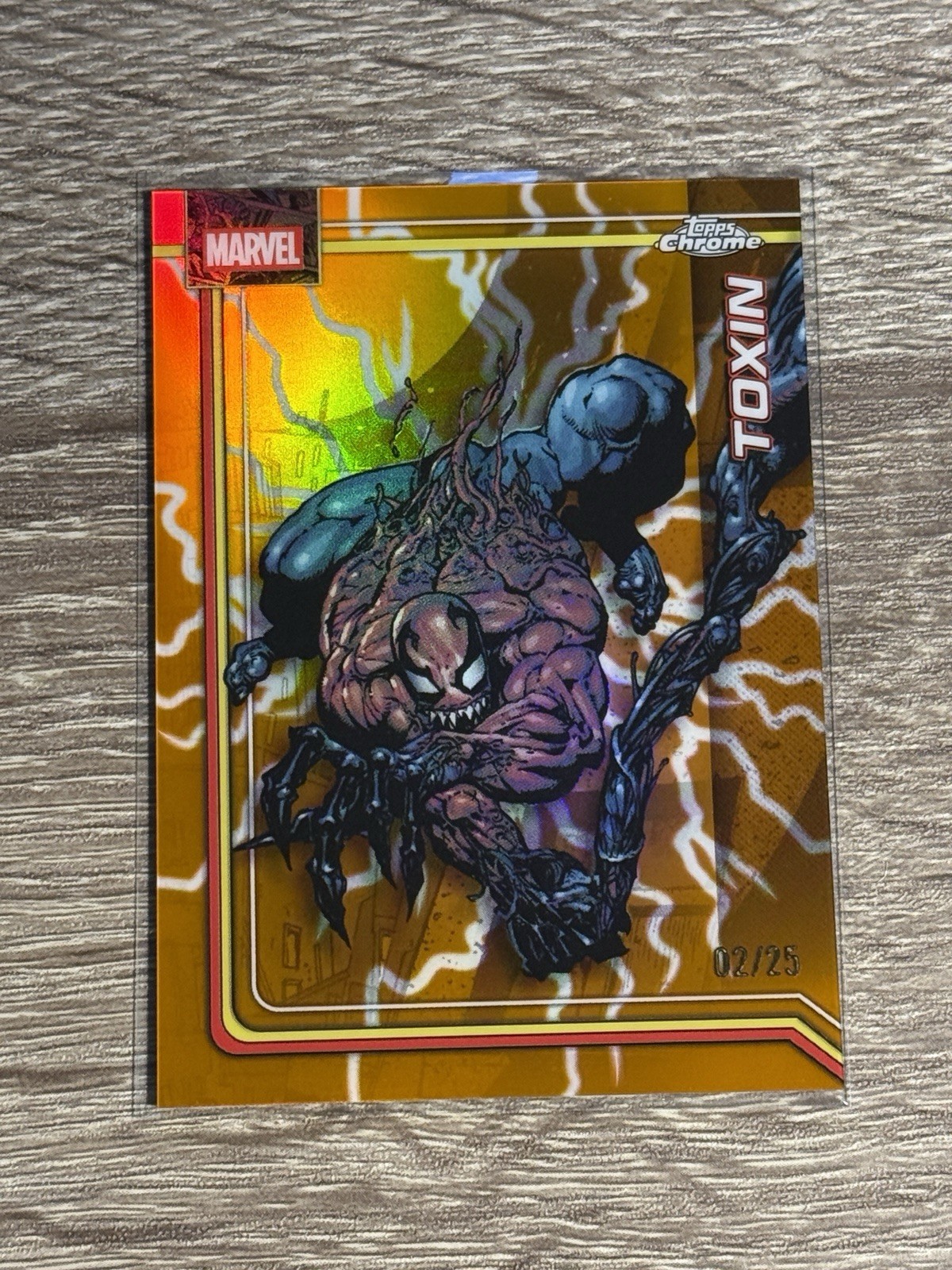 2026 Topps Chrome Marvel Toxin #181 Storm’s Orange Lightning Refractor /25
