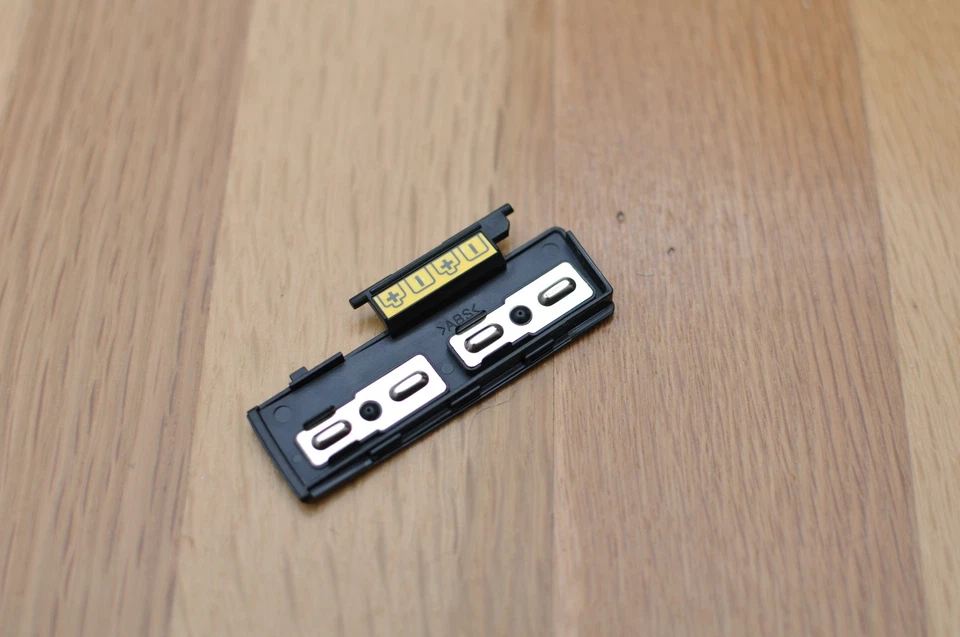 Conjunto de piezas de puerta de batería flash Pentax AF-540FGZ Foto 2 de 3