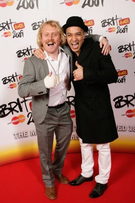 Leigh Francis and Jade Jones attend The BRIT Awards Earls Court 1 - Old Photo