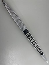 1959 Chevrolet RH Dashboard Emblem Molding  g2