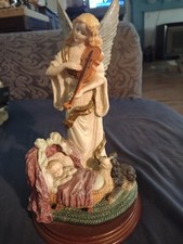 Guardian Angel Figurine protecting baby with dog looking on, 9 in tall.