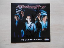 Status Quo autographs signed CD booklet "It's only rock & roll"