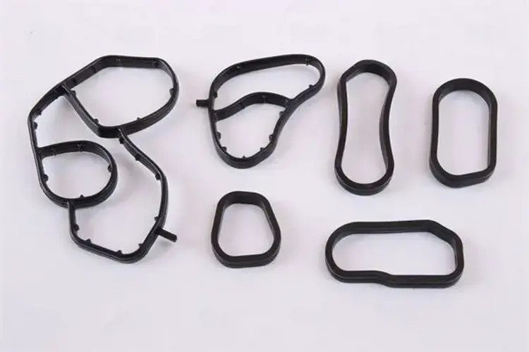 Engine oil cooler Water-cooled 90717 NISSENS for FORD CITROËN PEUGEOT MAZDA FIAT
