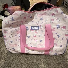 Hello Kitty Friends Wheeled Duffle Carry-On Luggage Travel Bag Bioworld