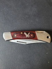 Elk Ridge pocket knife w/ wood grain sterling silver eagle inlaid handle