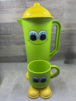 Vintage Deka Footsie Tootsie Smiley Face Orange Plastic Pitcher With Cup